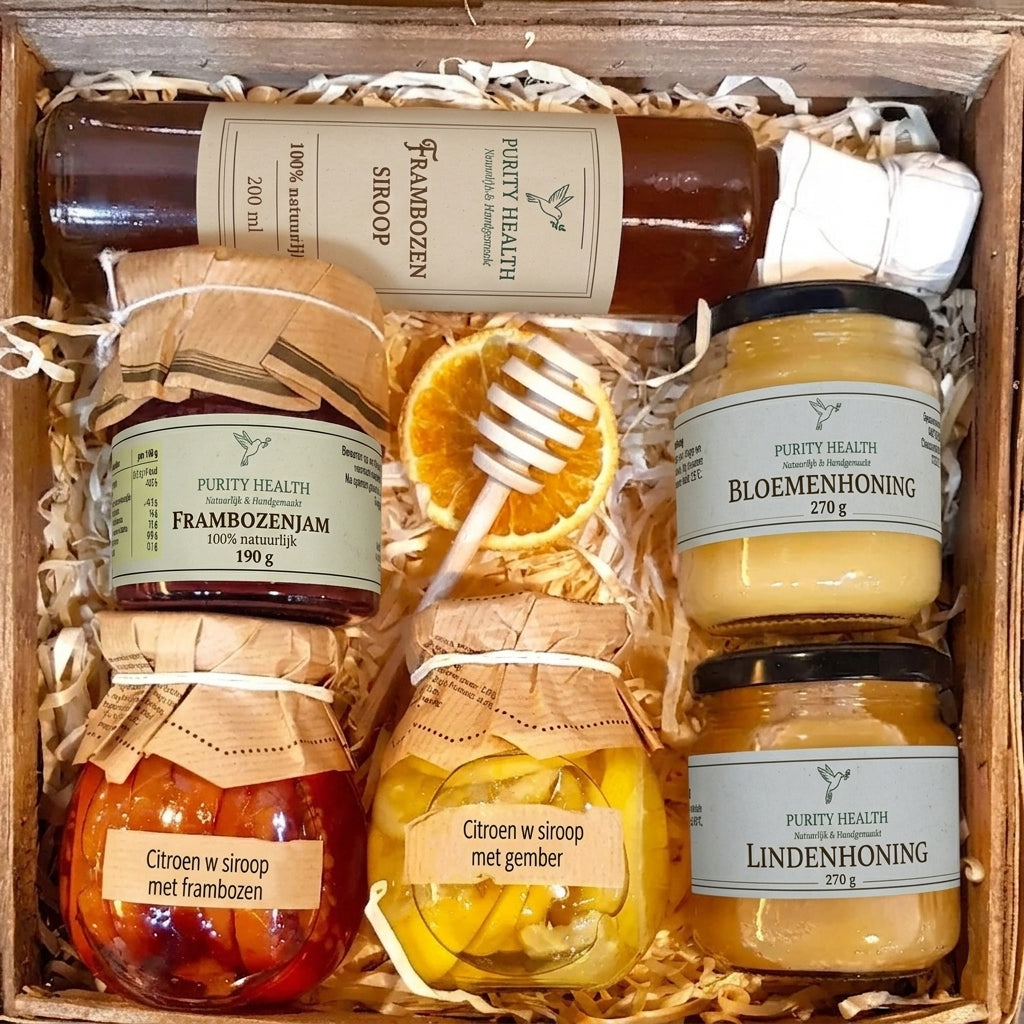 Cadeaupakket met honing, confituur, siroop en citroen op siroop – natuurlijk geschenk vol smaak en warmte
